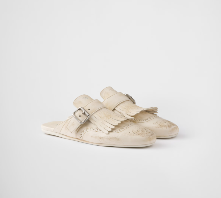 PRADA Shuffle fringed leather mules