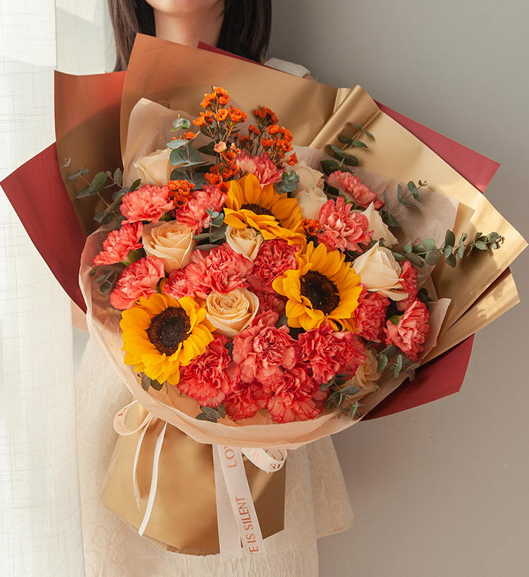 En pleine croissance / 3 tournesols, 19 œillets, 11 roses, 2 orchidées d'hiver