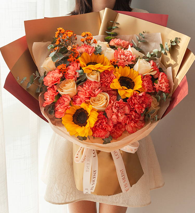 En pleine croissance / 3 tournesols, 19 œillets, 11 roses, 2 orchidées d'hiver