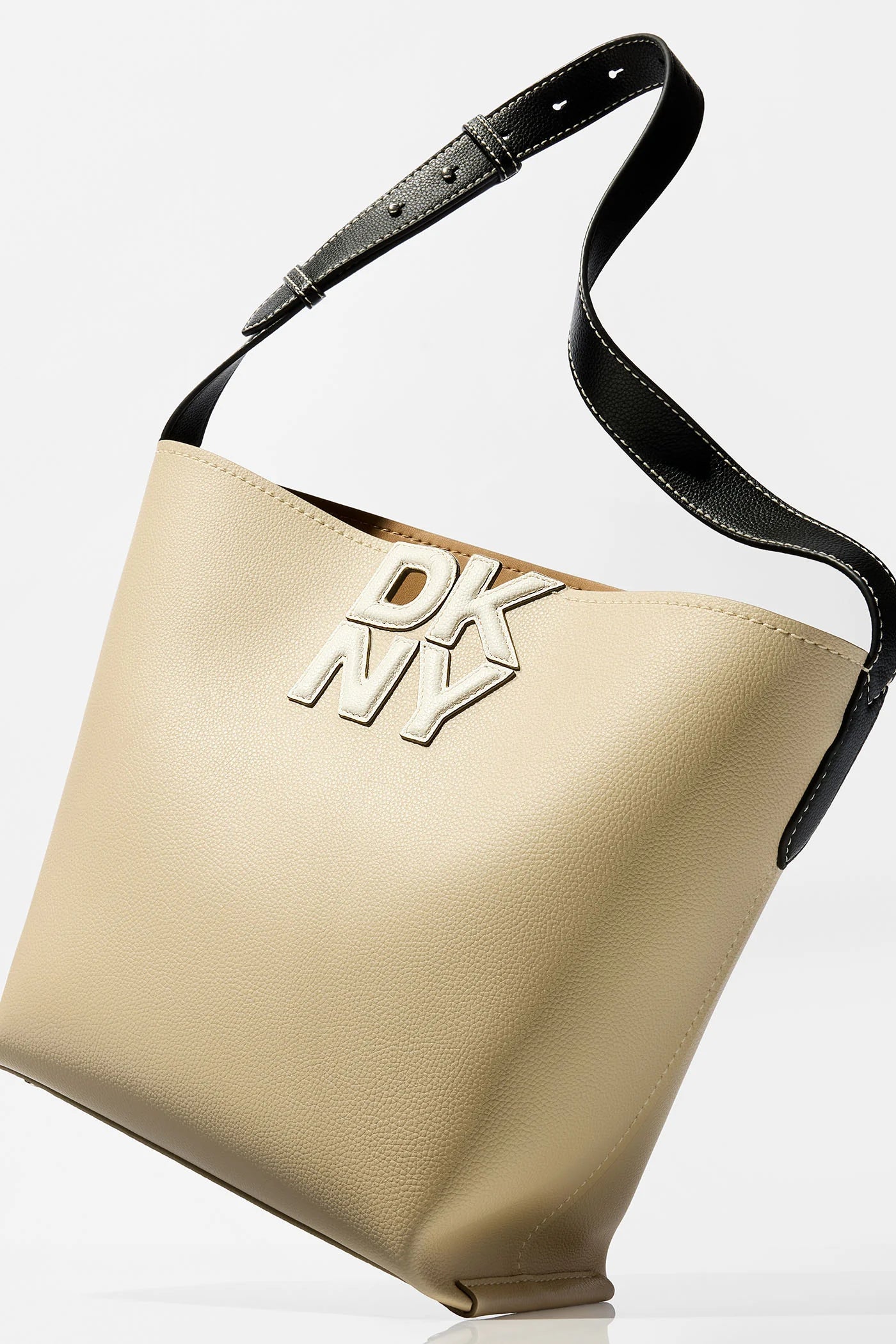 DKNY NICOLE LOGO EMBELLISHED BUCKET BAG